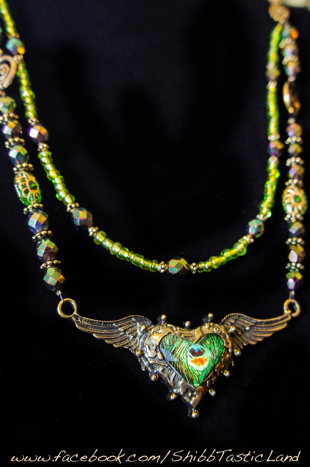 Steam-Powered Peacock Heart with Wings Necklace