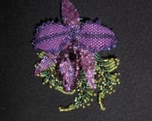 Diane's Cattleya Orchid. A fantasy bead embroidered and beadwoven brooch