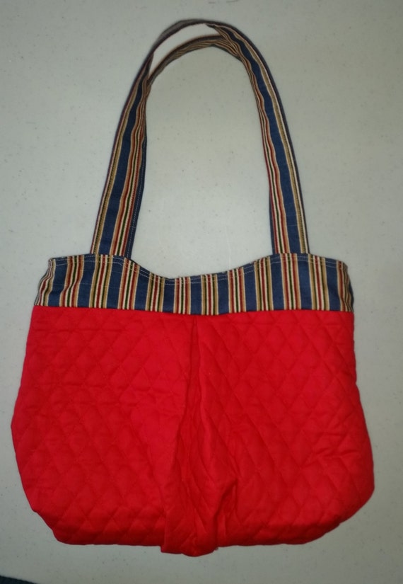 red quilted purse