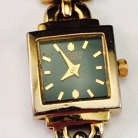 green face citizen watch