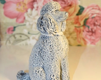 Realistic figurine Poodle of the marble chips