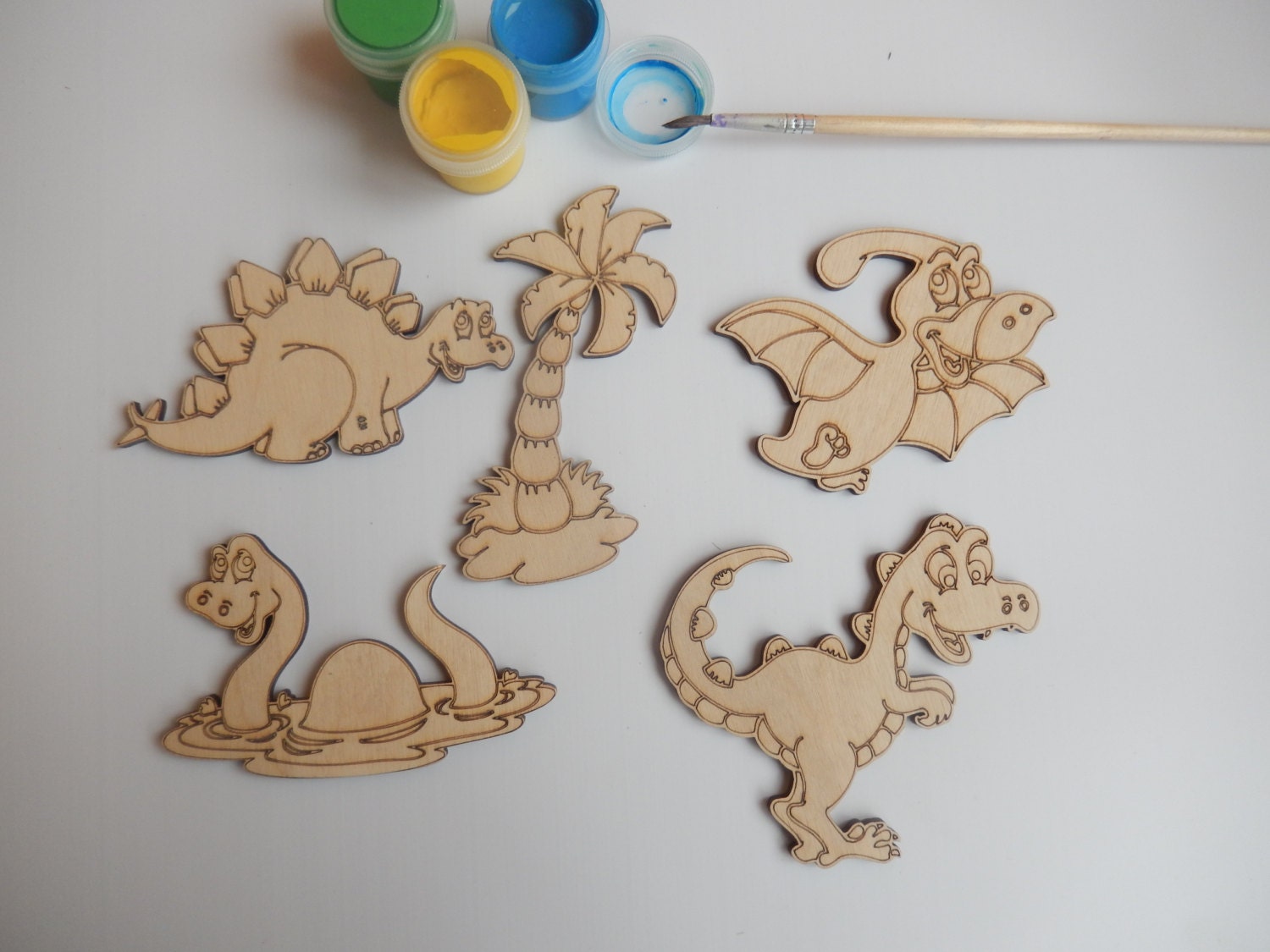 large wooden dinosaur cutouts