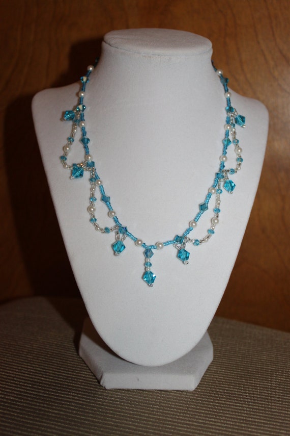 Blue swarovski crystal necklace with silver accents