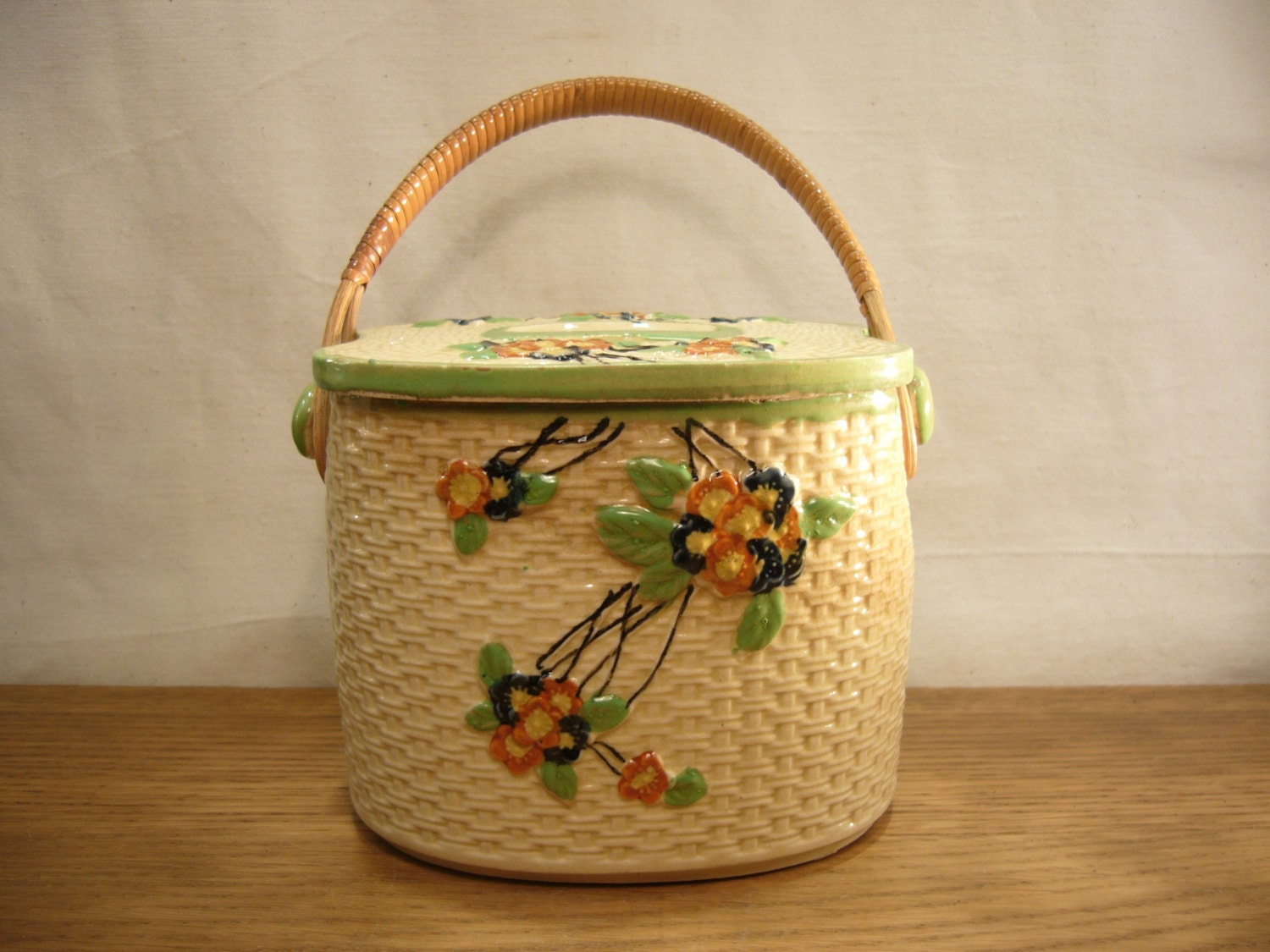 Vintage 1930s Japanese majolica biscuit jar with cane handle