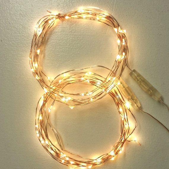 539 New fairy lights on copper wire 743 100 Fairy Lights (2*50) on coated copper wire string lights. These   