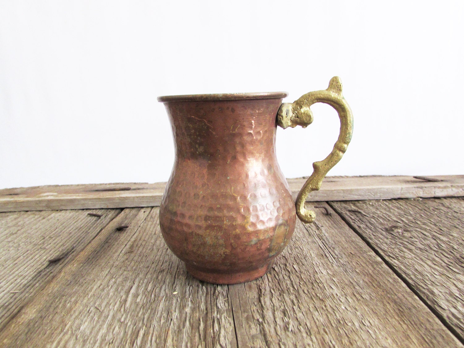 vintage copper mug with a brass handle Haute Juice