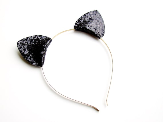All Listings Cat Ear Headbands. Channel cute feline spirit with our selection of cat ear headbands. This fierce and fun trend is the purr-fect finishing touch to your hairstyle. Our cat ears for girls come in all sorts of designs including: floral, bedazzled, light up, and more. If you find that your animal instincts are breaking through, animal ear.