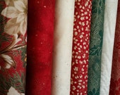 1/2 yard bundle of Moda's Let It Glow Fabric.   7 different fabrics