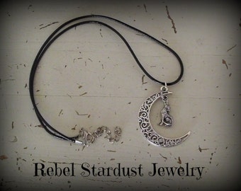 Crescent moon and howling wolf black necklace