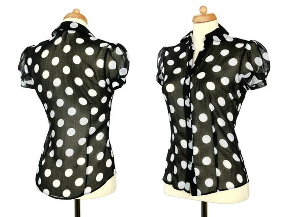 white and black polka dot blouse