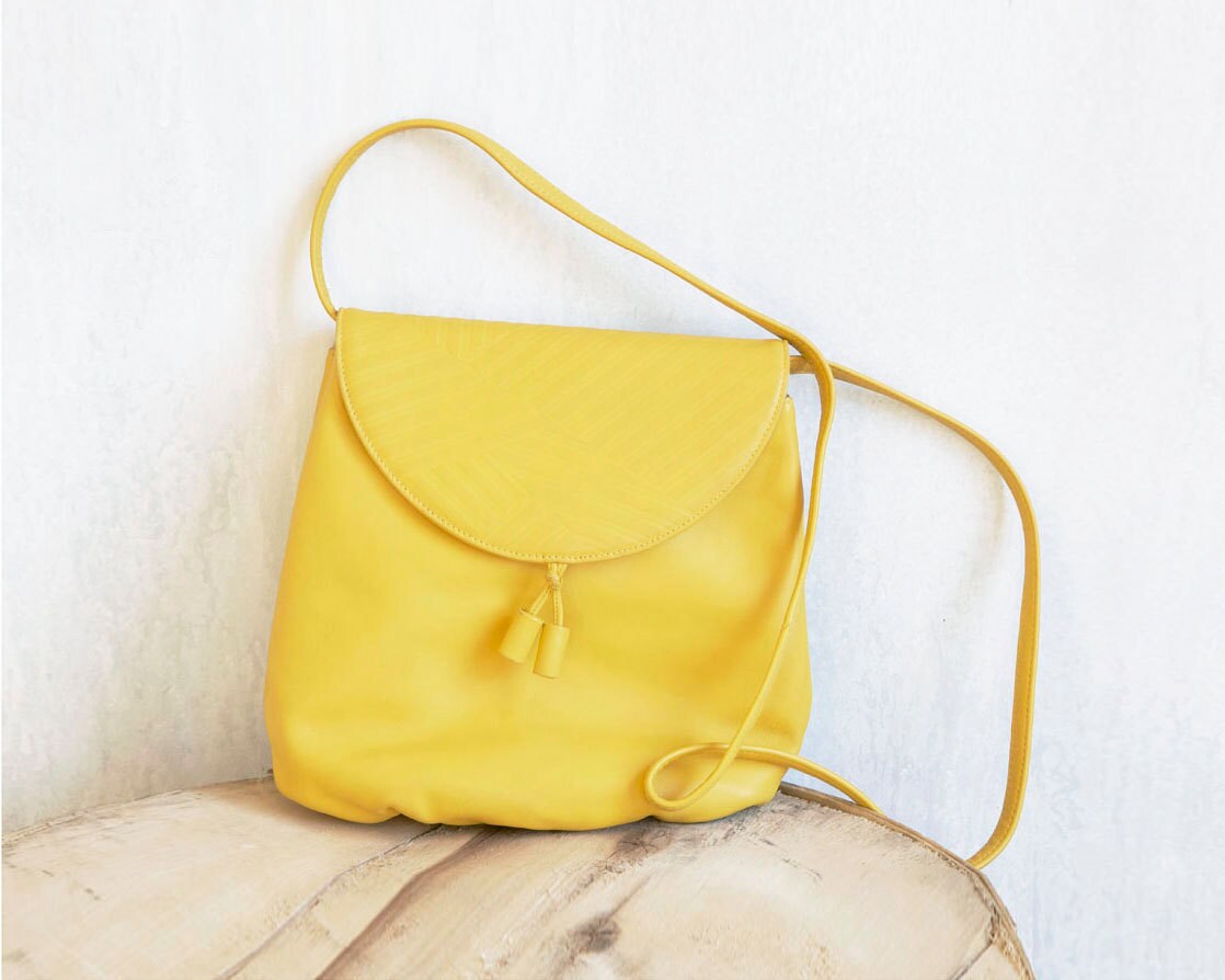 yellow cross body purse