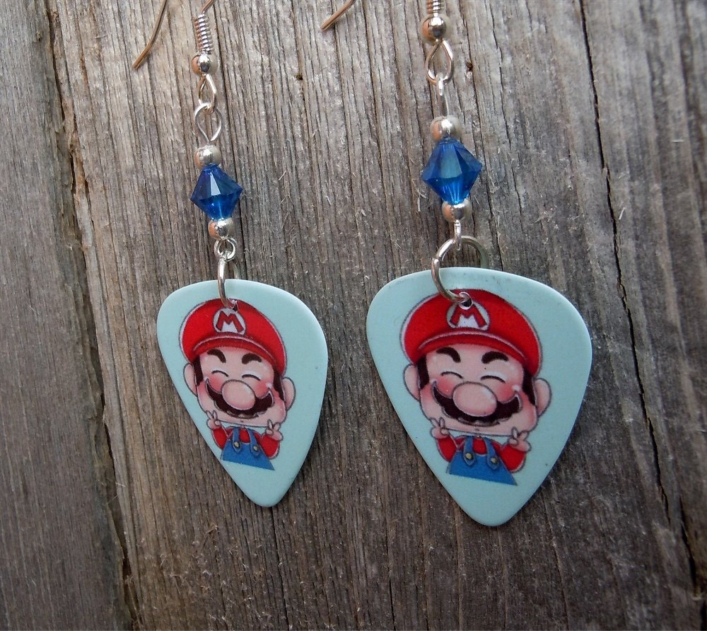 super-mario-guitar-pick-earrings-with-blue-crystals