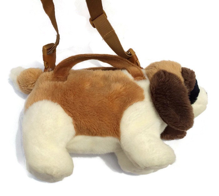 purse with stuffed animal