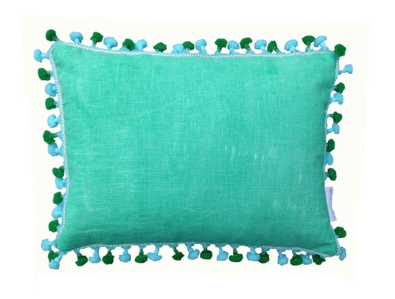 Sea Green cushion with aqua and green pompom tassle trim 30cm x 40cm