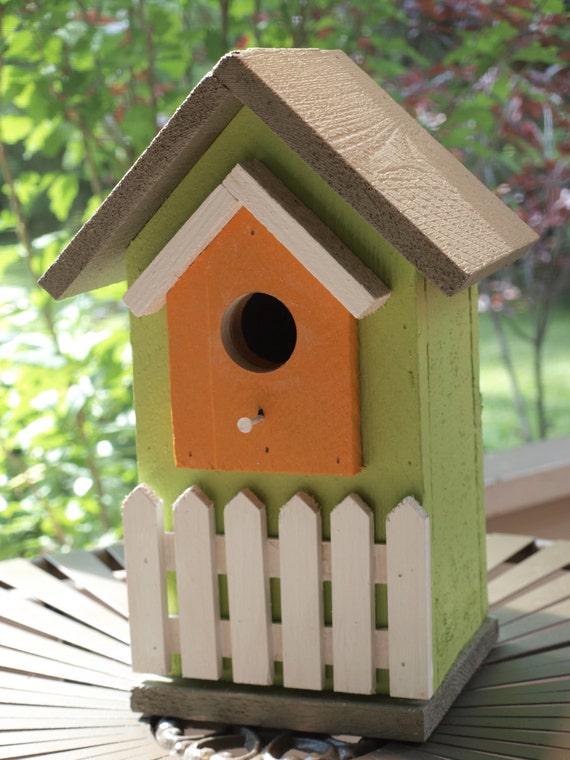 Birdhouse With White Picket Fence