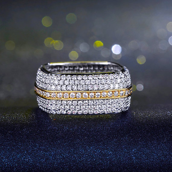 Two tone diamond eternity rings