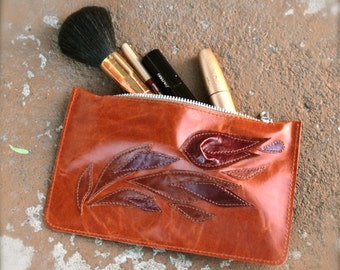 Cosmetic bag genuine leather.
