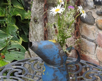 Blue vintage oil can