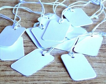 100 X Etiquettes blanches pour prix dimensions 25x15x0.3 mm