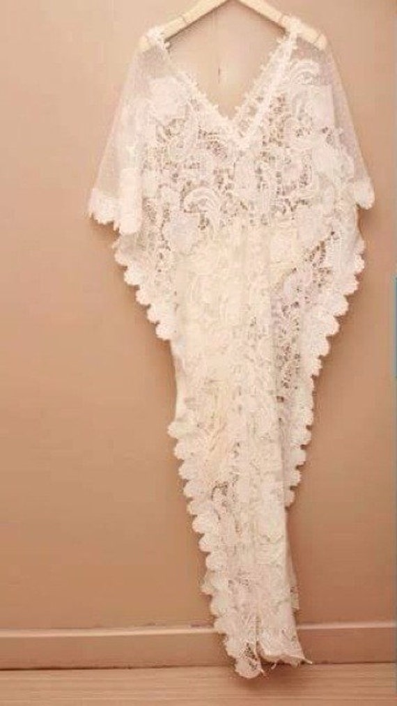 White lace kaftan dress with polkadot lace pattern on