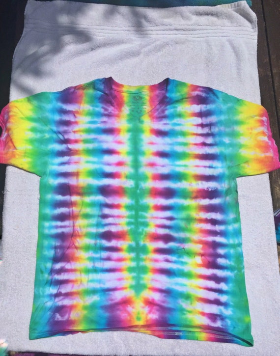 Items similar to Tie Dye Rainbow (Stripes) Fan Fold Tee on Etsy