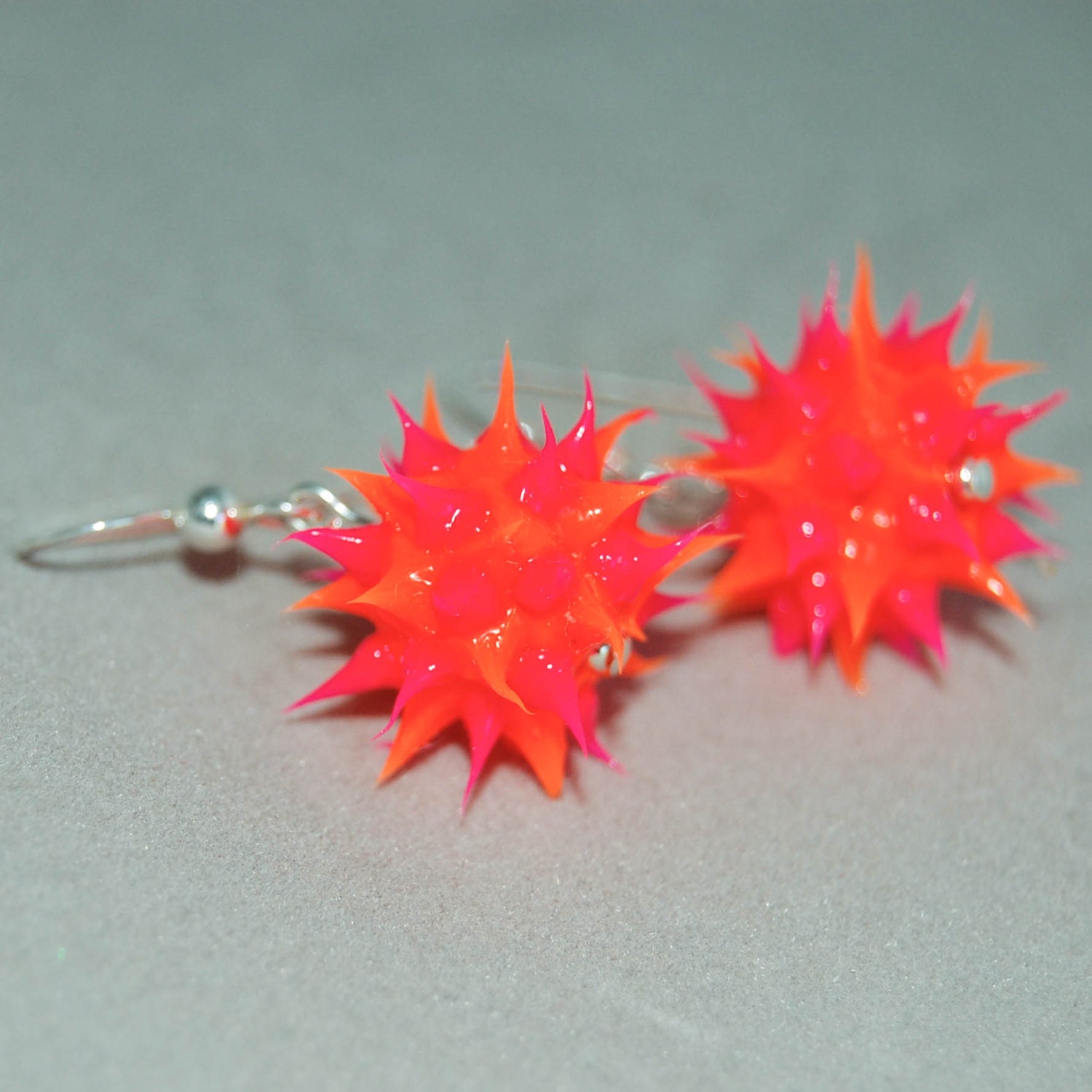 Spiky rubber earrings spiky ball earrings orange and pink