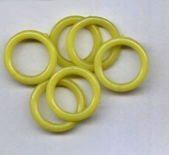 Items similar to vintage yellow jump rings, old plastic, yellow plastic