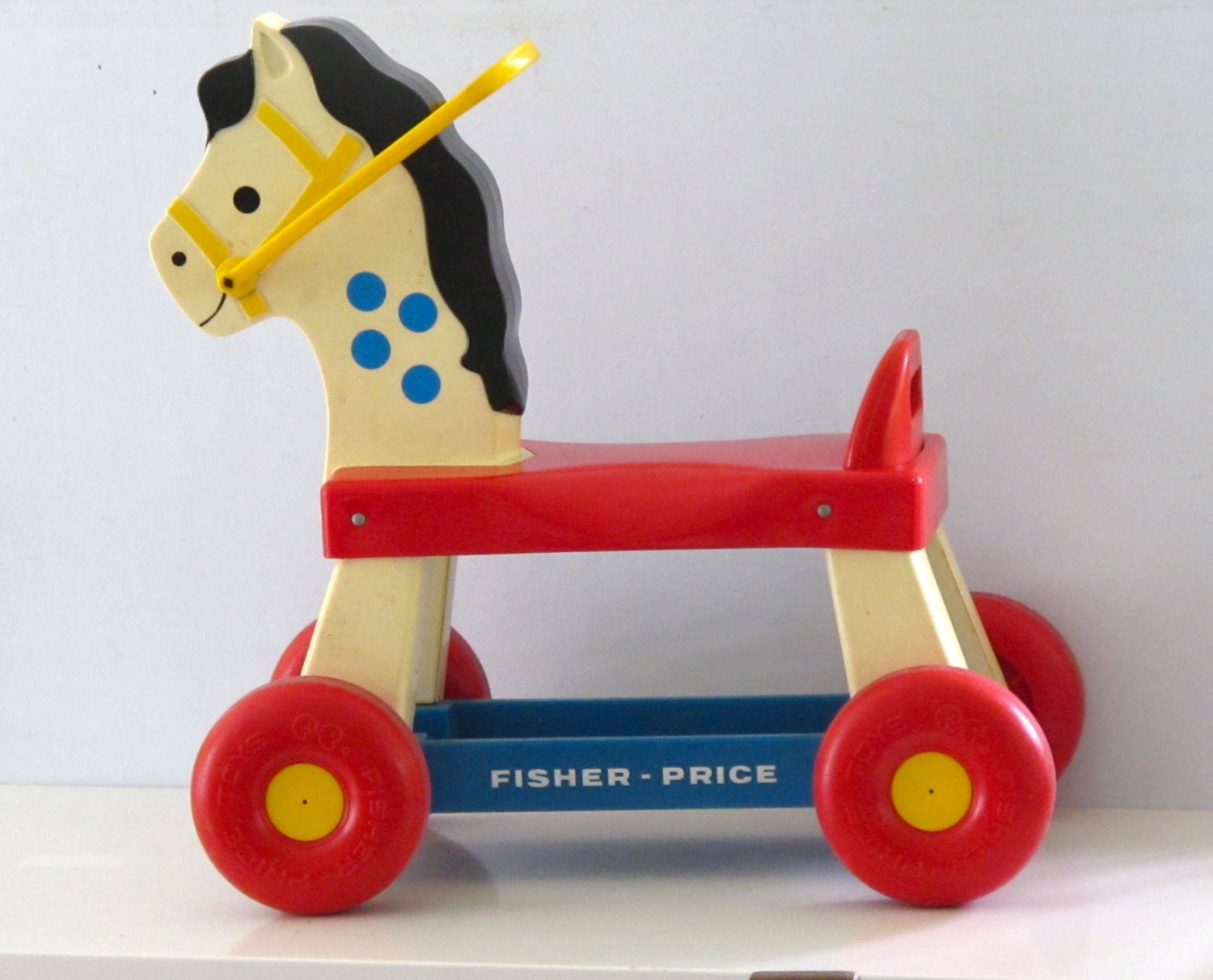 vintage toy riding horse