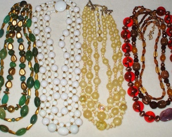 4 Vintage Triple strand glass beaded necklaces, signed Hong Kong