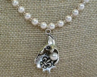 mardi gras pearl necklace meaning