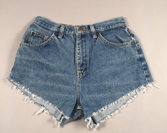 Items similar to Smokey bleached cut off shorts on Etsy