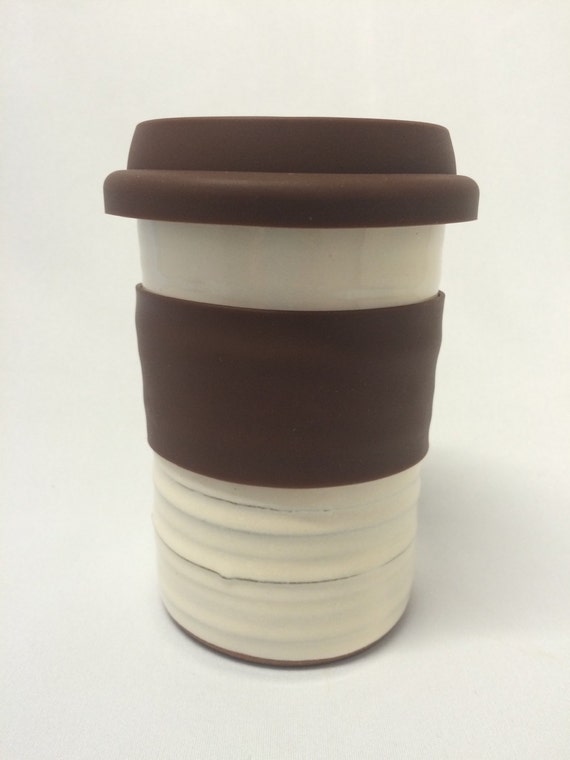 ceramic travel mug with silicone lid and sleeve