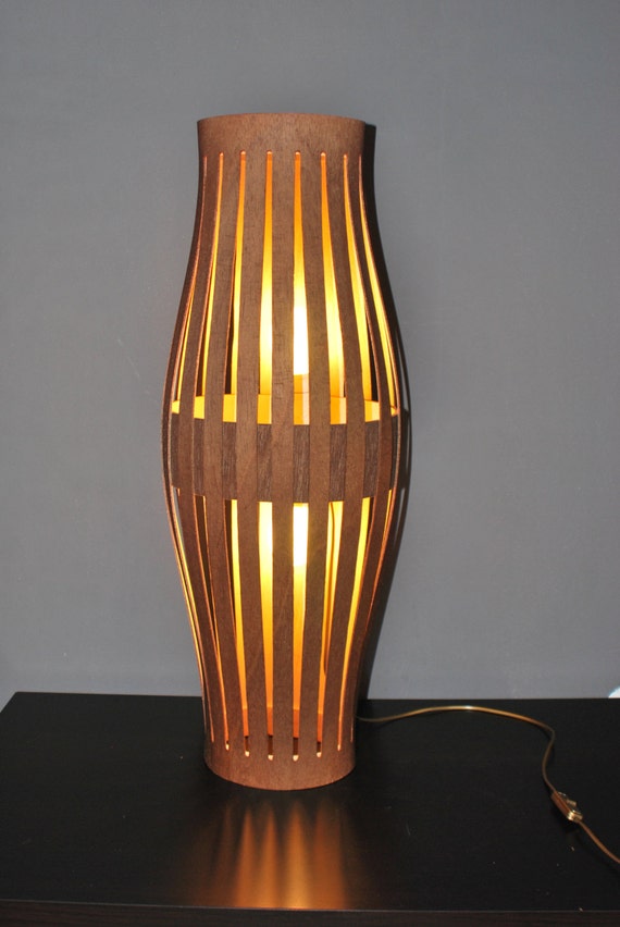 Floor bright lamp made from bent plywood.