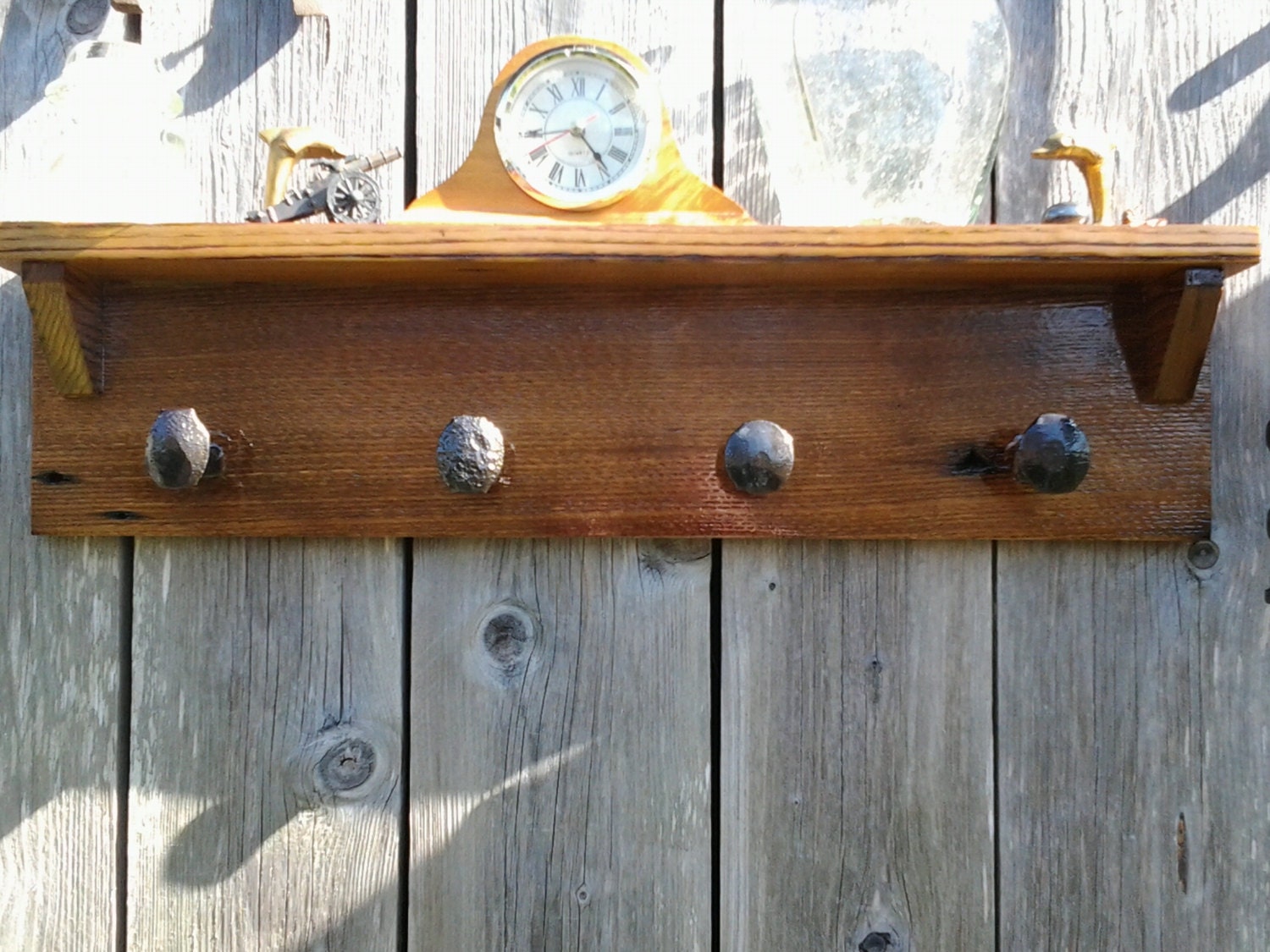 Barn wood and railroad spike coat rack made by BlueMountWoodCrafts