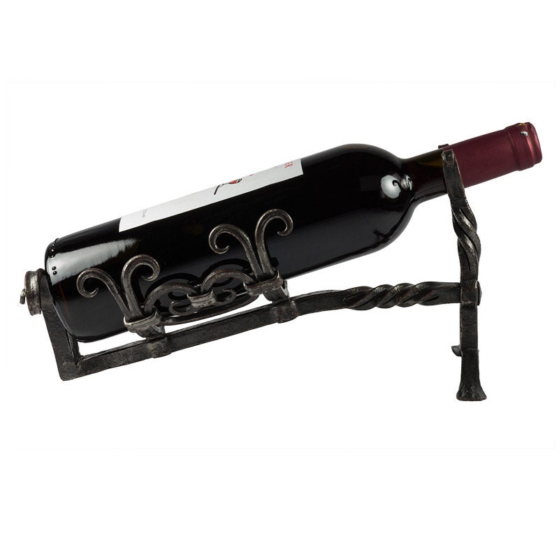 Unique wine bottle holder out of wrought iron