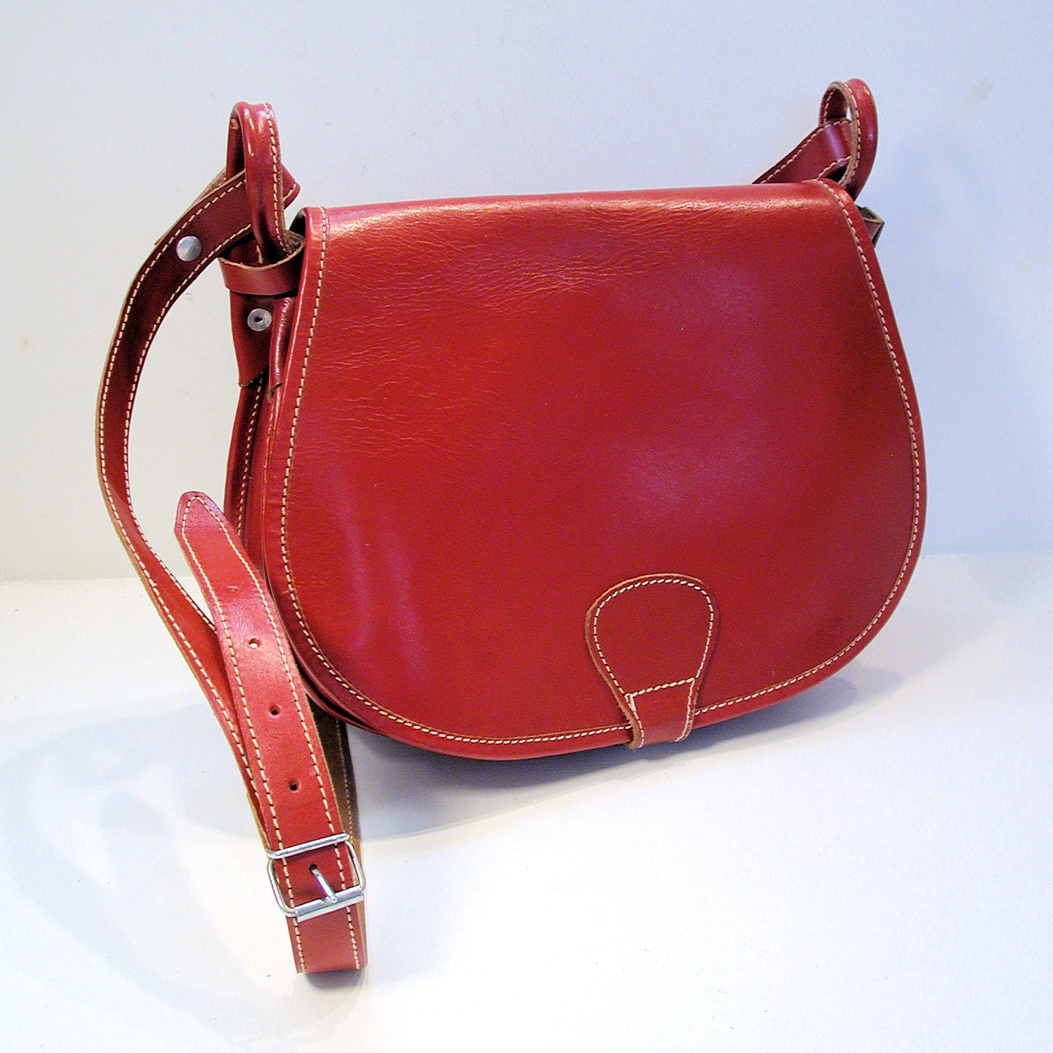 small red leather shoulder bag