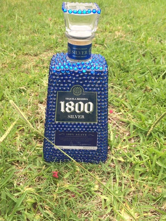 Blue bedazzled 1800 liquor bottle