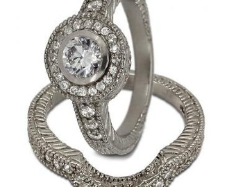 Diamond Bridal Set In White Gold With A Halo Engagement Ring Design And Milgrain