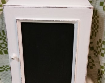 Distressed white cabinet