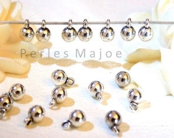 Lot de 10 breloques rondes bombées couleur argent dimensions 4 x 6 mm