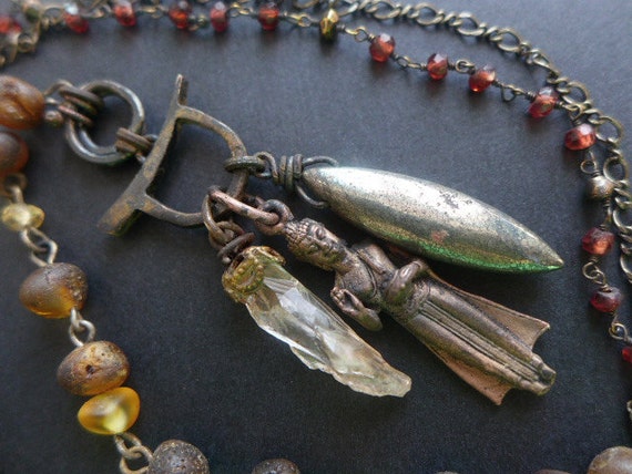 Theosophy. Rustic buddhist assemblage necklace with Baltic amber, garnet, pyrite, quartz.