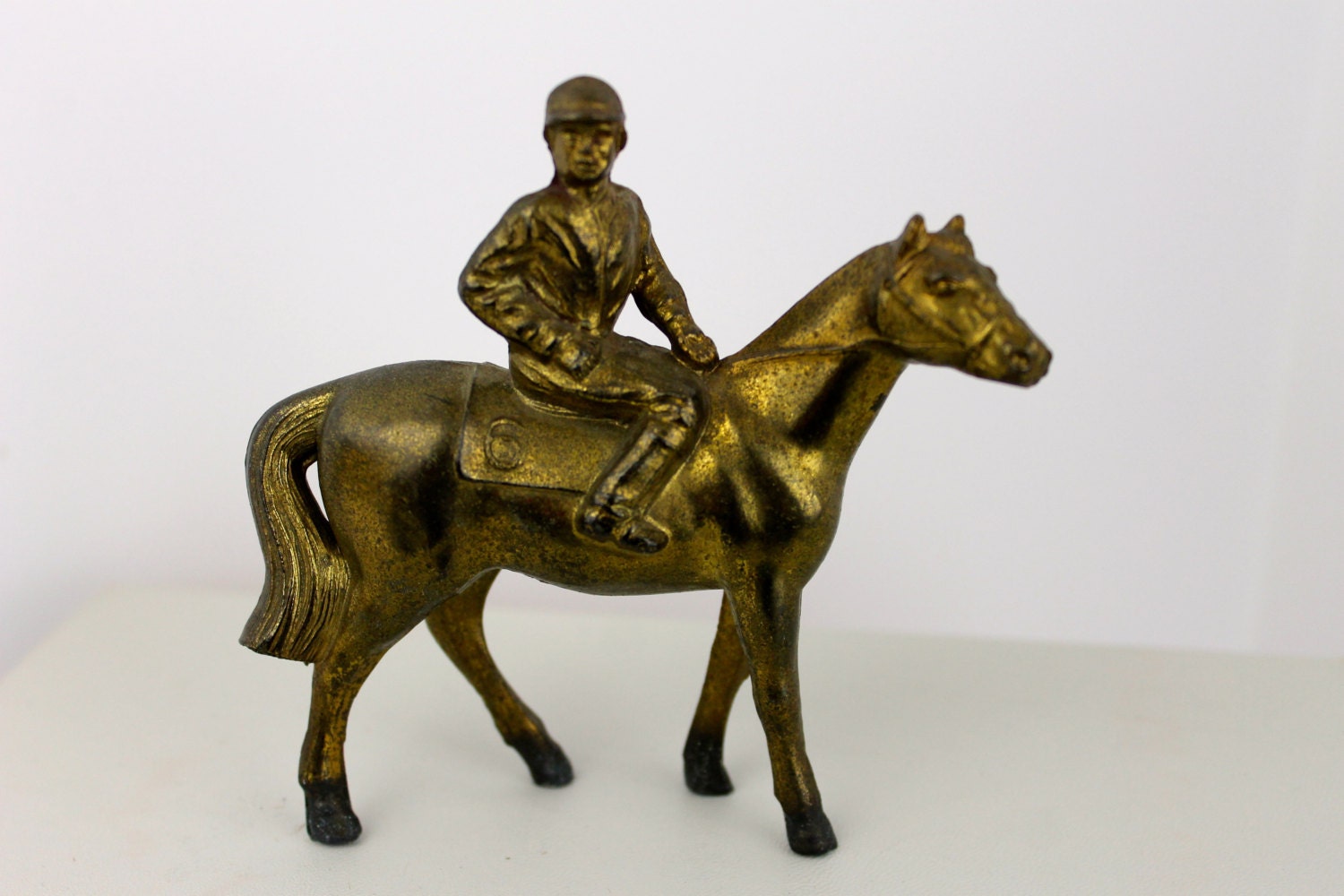 horse jockey figurine