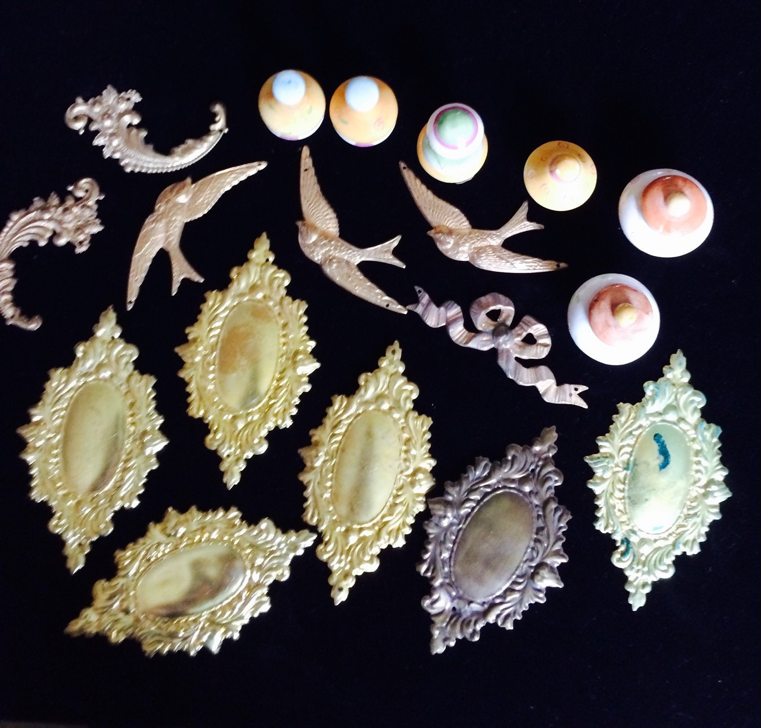 Furniture embellishments stamped brass and assorted ceramic knobs set