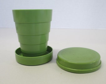 Vintage Stanhome travel collapsible cup pill dispencer. Used