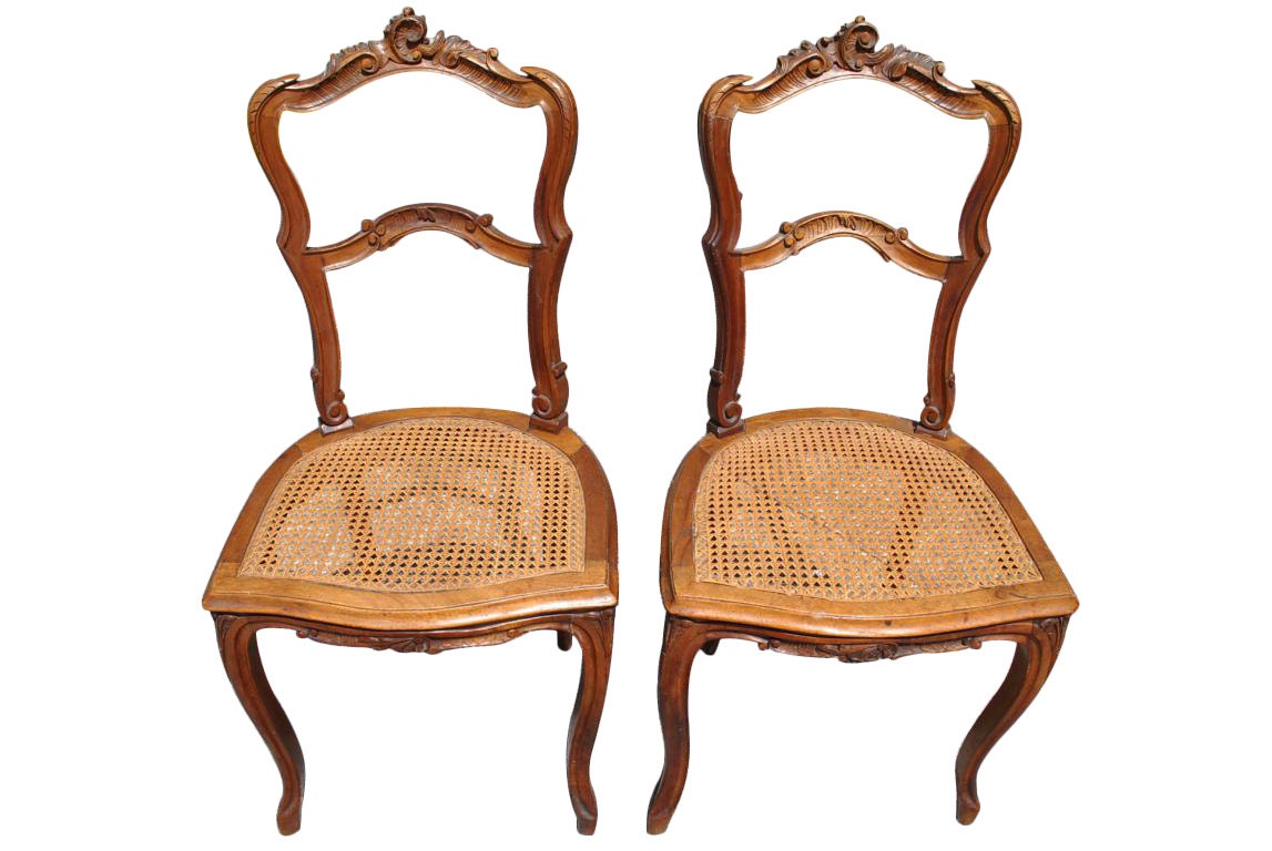 Antique Pair of French Rococo Cane Bottom Carved Walnut Side Chairs