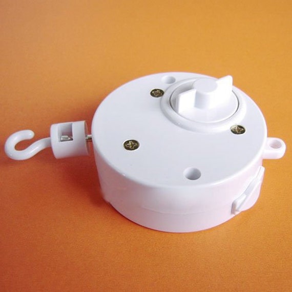 Rotating music box WindUp for Music & Spinning Motion