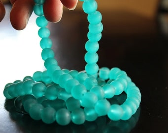 100 approx. 8 mm sea glass green frosted glass beads, round and smooth, one strand for making jewelry