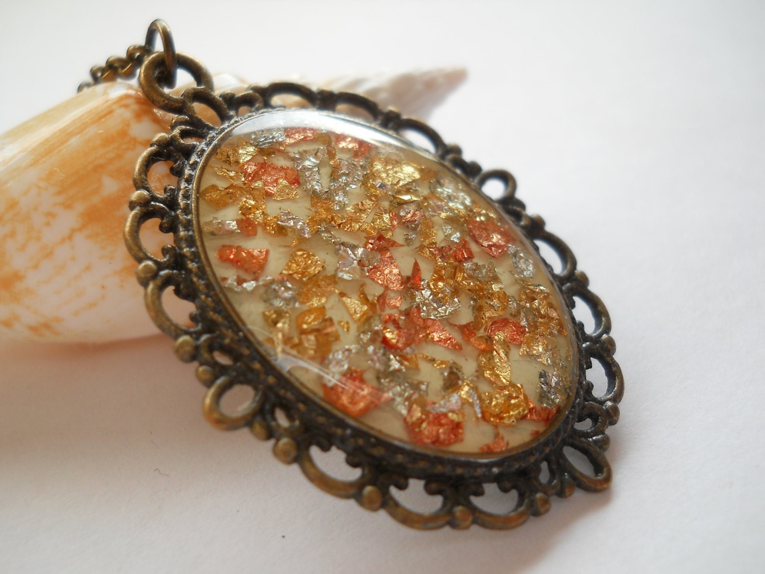 Metallic flakes oval pendant gold flakes jewelry by LightPurple