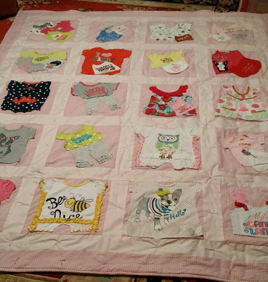 Adorable baby clothes keepsake quilt