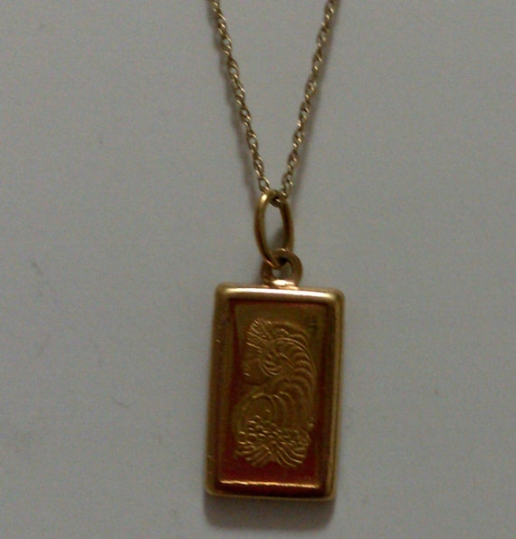 Pure 999.9 Solid Gold Brick. Gold Biscuit Set in 22kt gold case. 1g+1g=2g Gold Charm Pendant